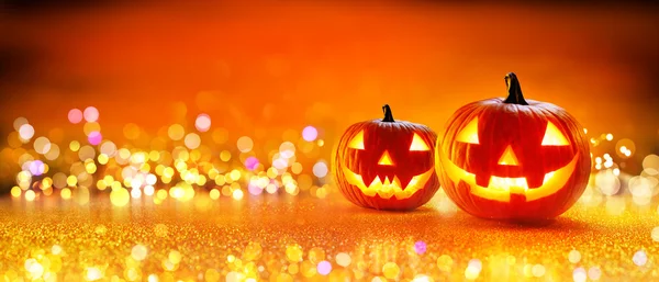 Halloween pompoen met verlichting en Sparkle Bokeh achtergrond — Stockfoto