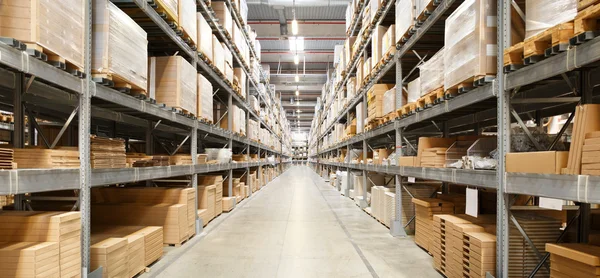 Rows Of Shelves With Boxes In Warehouse Royalty Free Stock Images
