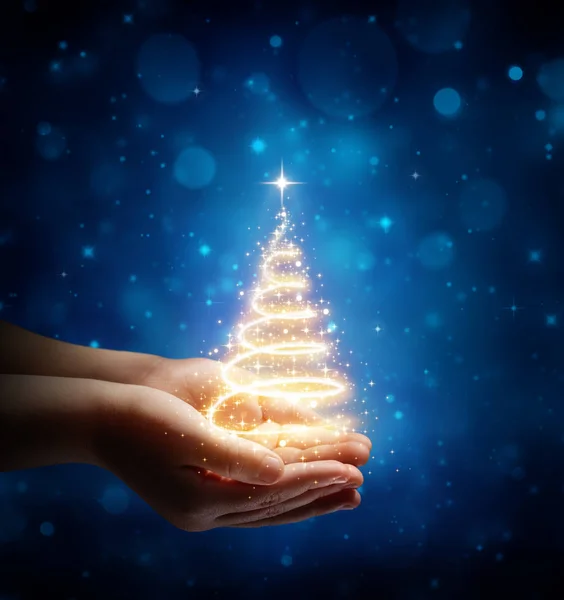Noel çocuk elinde sihirli — Stok fotoğraf