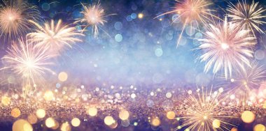 Abstract Golden Glitter Background With Fireworks clipart