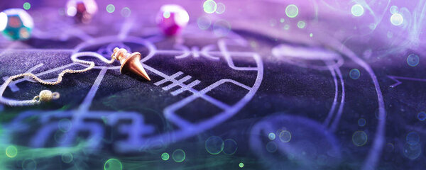 Esoteric Concept - Pendulum On Blurred Altar With Smoke and Bokeh
 