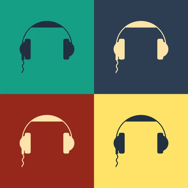 Icono de auriculares de color aislado sobre fondo de color. Signo de auriculares. Concepto para escuchar música, servicio, comunicación y operador. Dibujo de estilo vintage. Ilustración vectorial — Vector de stock