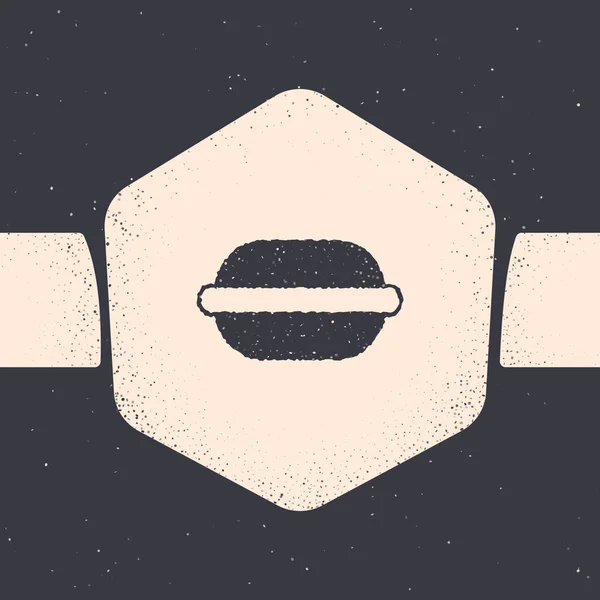 Grunge Macaron cookie ikona izolovaná na šedém pozadí. Makarónová sladká pekárna. Černobílý vinobraní. Vektorová ilustrace — Stockový vektor