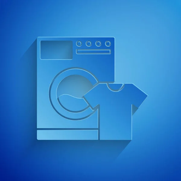 Paper cut Washer and t-shirt icon isolated on blue background. Washing machine icon. Clothes washer, laundry machine. Home appliance symbol. Paper art style. Vector Illustration — Stock Vector