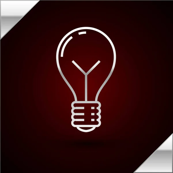 Серебристая лампочка с иконкой идеи, выделенной на темно-красном фоне. Символ энергии и идеи. Концепция вдохновения. Векторная миграция — стоковый вектор