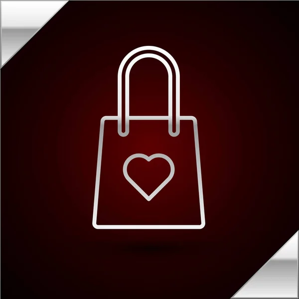 Koyu kırmızı arka planda kalp ikonu olan gümüş çizgili alışveriş torbası. Alışveriş torbası sevgisi kalp ikonu gibidir. Sevgililer Günü sembolü. Vektör İllüstrasyonu — Stok Vektör