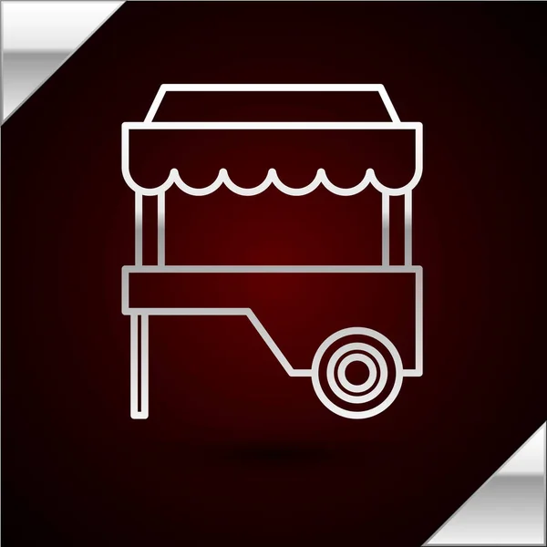 Silberne Linie Fast-Food-Wagen mit Markise Symbol isoliert auf dunkelrotem Hintergrund. Stadtkiosk. Vektorillustration — Stockvektor
