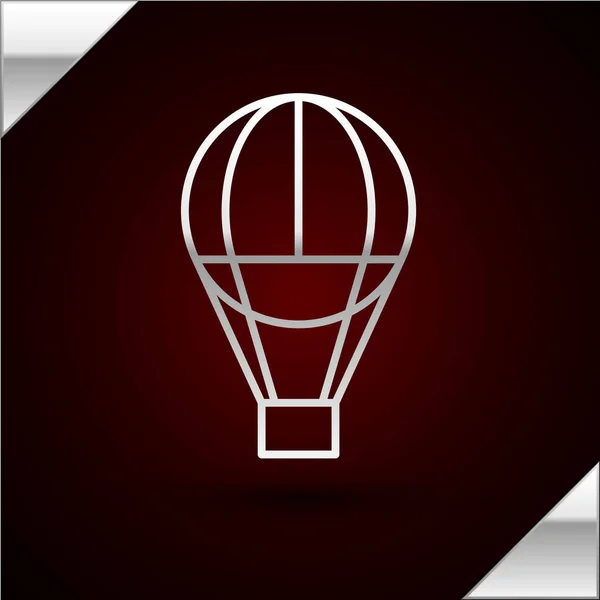 Silver line Hot air balloon icon isolated on dark red background. Air transport for travel. Vector Illustration — Stock vektor
