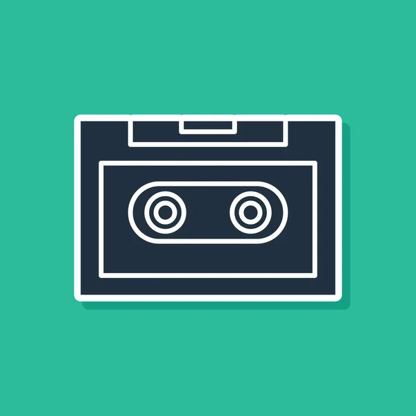 Icono de cinta de audio retro azul aislado sobre fondo verde. Ilustración vectorial — Vector de stock