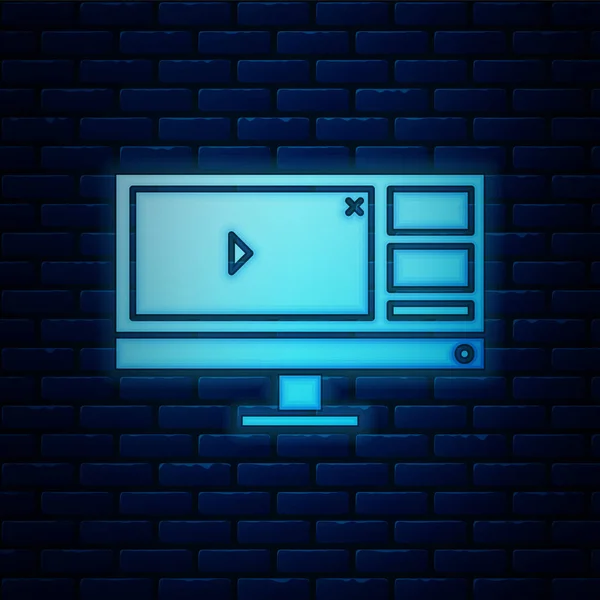 Grabadora de vídeo o software de editor de neón brillante en el icono del monitor de la computadora aislado en el fondo de la pared de ladrillo. Ilustración vectorial — Vector de stock
