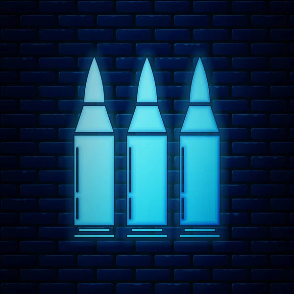 Glödande neon Bullet ikon isolerade på tegel vägg bakgrund. Vektorillustration — Stock vektor