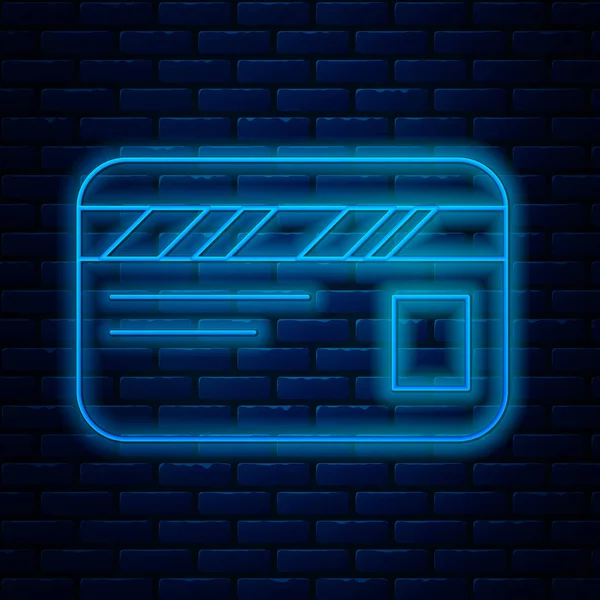 Glowing neon line Credit card icon isolated on brick wall background. Online payment. Cash withdrawal. Financial operations. Shopping sign. Vector Illustration — Stock Vector