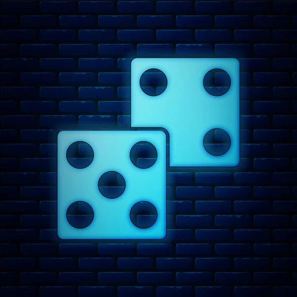 Glowing neon Game dice icon isolated on brick wall background. Casino gambling. Vector Illustration