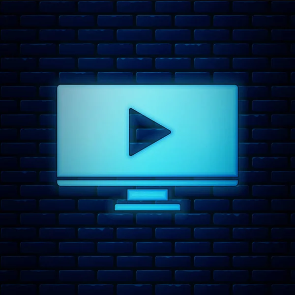 Glödande neon Online spela video ikon isolerad på tegel vägg bakgrund. Datorskärm och filmremsa med lekskylt. Vektor Illustration — Stock vektor