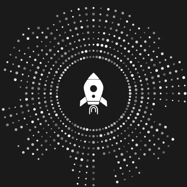 White Rocket ship with fire icon isolated on grey background. Space travel. Abstract circle random dots. Vector Illustration