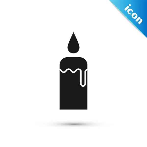 Vela Ardiente Negra en icono de candelero aislado sobre fondo blanco. Vara cilíndrica con llama ardiente. Ilustración vectorial — Vector de stock