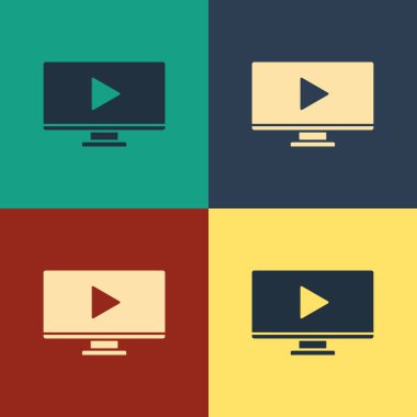 Renk arkaplanı üzerinde Renk Çevrimiçi video simgesi izole edildi. Bilgisayar monitörü ve oyun işaretli film şeridi. Klasik tarzda çizim. Vektör İllüstrasyonu