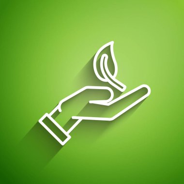 Çevre koruma ikonunun elindeki beyaz çizgi yeşil arka planda izole edilmiş. Tohum ve tohum. Fidan dikiyorum. Ekoloji konsepti. Vektör İllüstrasyonu