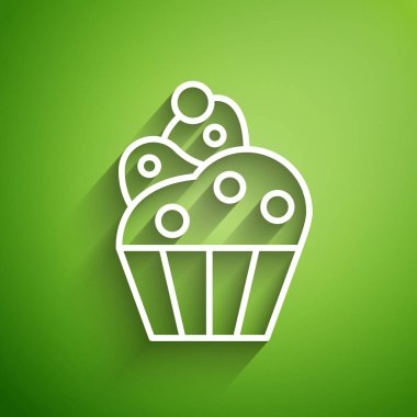 Beyaz çizgi Cupcake simgesi yeşil arkaplanda izole edildi. Vektör İllüstrasyonu