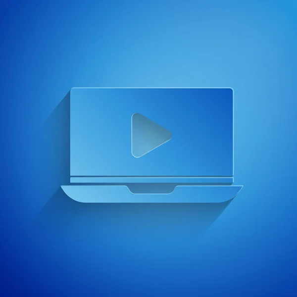 Papier geschnitten Online-Play-Video-Symbol isoliert auf blauem Hintergrund. Laptop und Filmstreifen mit Spielschild. Papierkunst. Vektorillustration — Stockvektor