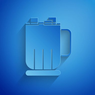 Kağıt kesiği Sıcak çikolata bardağı ve mavi arka planda izole edilmiş lokum ikonu. Mutlu Noeller ve mutlu yıllar. Kağıt sanatı tarzı. Vektör İllüstrasyonu