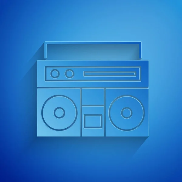 Paper cut Home stereo z dwiema ikonami głośnikowymi izolowanymi na niebieskim tle. System muzyczny. Papier w stylu sztuki. Ilustracja wektora — Wektor stockowy