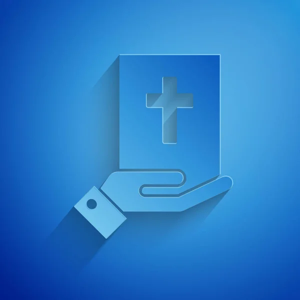 Paper cut Oath on the Holy Bible icon isolated on blue background. The procedure in court. Truth and truth. Promise before god. Paper art style. Vector Illustration — Stock Vector