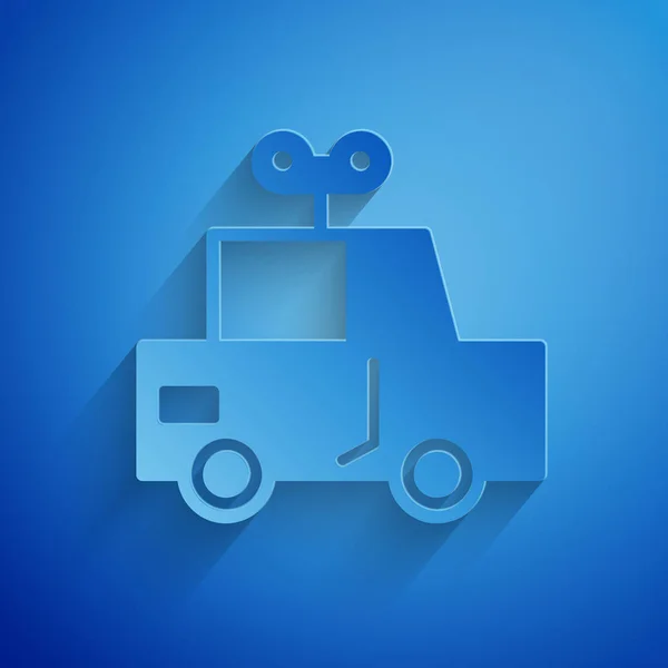 Corte de papel icono de coche de juguete aislado sobre fondo azul. Estilo de arte de papel. Ilustración vectorial — Vector de stock