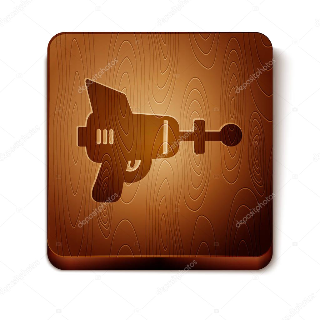 Brown Ray gun icon isolated on white background. Laser weapon. Space blaster. Wooden square button. Vector Illustration