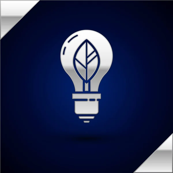 Silver Light bulb with leaf icon isolated on dark blue background. Eco energy concept. Alternative energy concept. Vector Illustration — Stock Vector