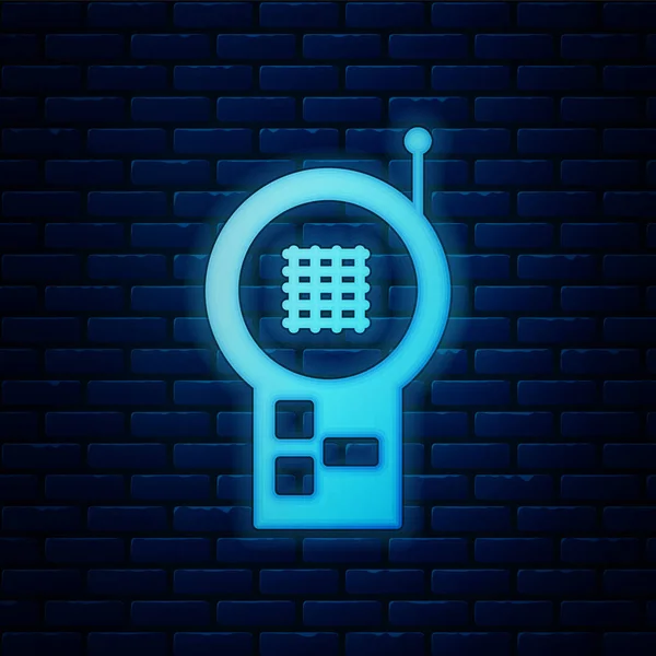 Monitor de neón brillante Walkie Talkie icono aislado en el fondo de la pared de ladrillo. Ilustración vectorial — Archivo Imágenes Vectoriales