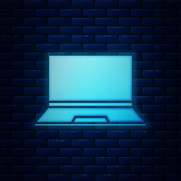 Glödande neon bärbar dator ikon isolerad på tegel vägg bakgrund. Dator anteckningsbok med tom skärm tecken. Vektor Illustration — Stock vektor