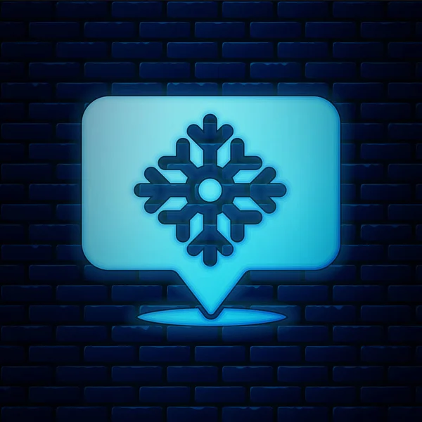 Glödande neon snöflinga med tal bubbla ikon isolerad på tegel vägg bakgrund. God Jul och Gott Nytt År. Vektor Illustration — Stock vektor