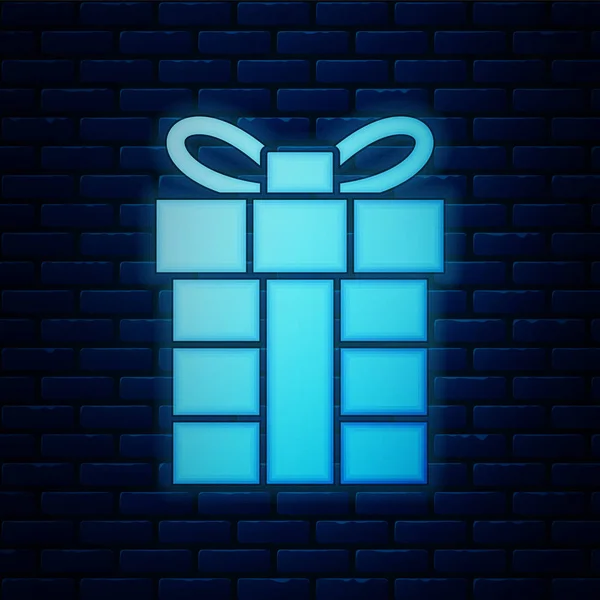 Светящийся неоновый значок коробки подарка изолирован на фоне кирпичной стены. С Рождеством и Новым годом. Векторная миграция — стоковый вектор