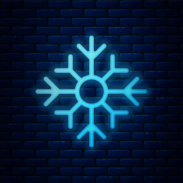 Glödande neon Snowflake ikon isolerad på tegel vägg bakgrund. God Jul och Gott Nytt År. Vektor Illustration — Stock vektor