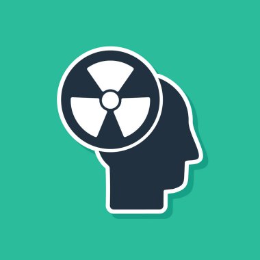 Bir insan kafasının mavi silueti ve yeşil arka planda izole edilmiş bir radyasyon sembolü. Vektör İllüstrasyonu