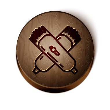 Kahverengi çizgi, beyaz arka planda izole edilmiş elektrikli saç makasıyla ya da tıraş ikonu ile kesişmiş. Berber dükkanı sembolü. Tahta daire düğmesi. Vektör İllüstrasyonu