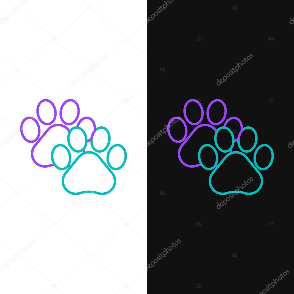 Green and purple line Paw print icon isolated on white and black background. Dog or cat paw print. Animal track.  Vector Illustration