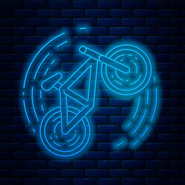 Leuchtende Leuchtschrift Fahrrad Trick-Symbol isoliert auf Backsteinwand Hintergrund. Radrennen. Extremsport. Sportgeräte. Vektorillustration — Stockvektor