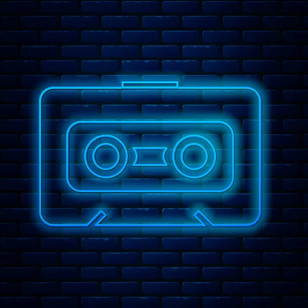 Parlayan neon hattı Retro ses kaset ikonu tuğla duvar arka planında izole edildi. Vektör İllüstrasyonu — Stok Vektör