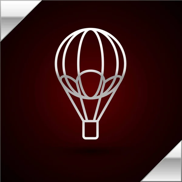 Silver line Hot air balloon icon isolated on dark red background. Air transport for travel. Vector Illustration — Stock vektor