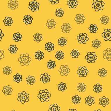 Mavi çizgi Atom simgesi sarı arkaplandaki kusursuz deseni izole etti. Bilimin, eğitimin, nükleer fiziğin, bilimsel araştırmaların sembolü. Elektron ve proton işaretleri. Vektör İllüstrasyonu