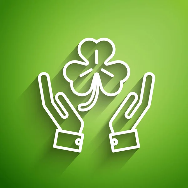 Fehér vonal Az emberi kéz négy levél lóhere ikont tart, zöld alapon elszigetelve. Boldog Szent Patrik napot. Vektorillusztráció — Stock Vector