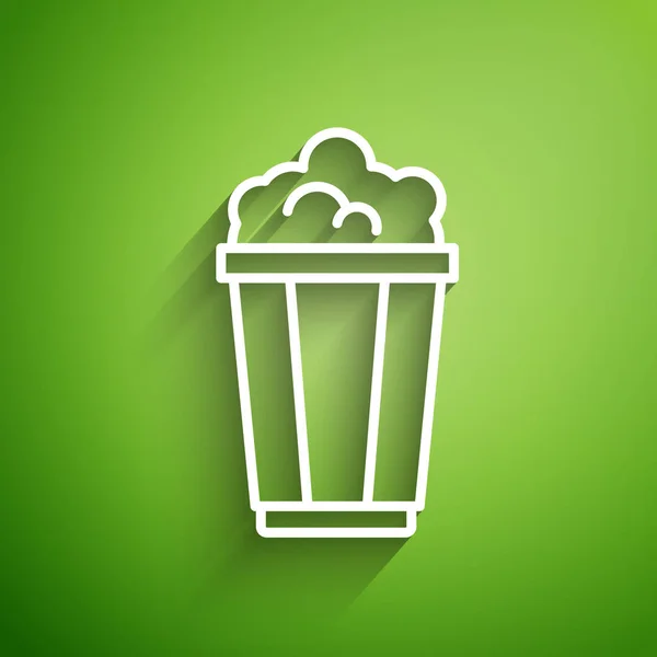 Ligne blanche Popcorn dans boîte en carton icône isolée sur fond vert. Boîte à seau de maïs soufflé. Illustration vectorielle — Image vectorielle