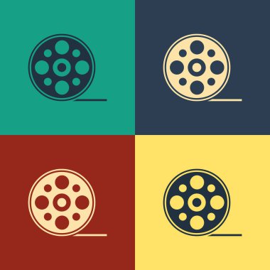 Renkli Film makarası simgesi renk arkaplanında izole edildi. Klasik tarzda çizim. Vektör İllüstrasyonu