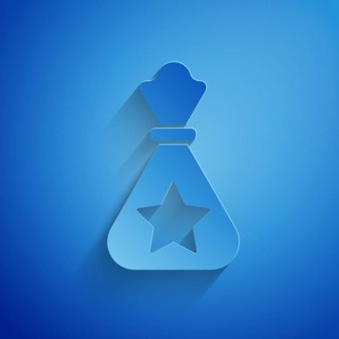 Kağıt kesiği Noel Baba hediye çantası ikonu mavi arka planda izole edilmiş. Noel hediyeleri çuvalı. Mutlu Noeller ve mutlu yıllar. Kağıt sanatı tarzı. Vektör İllüstrasyonu