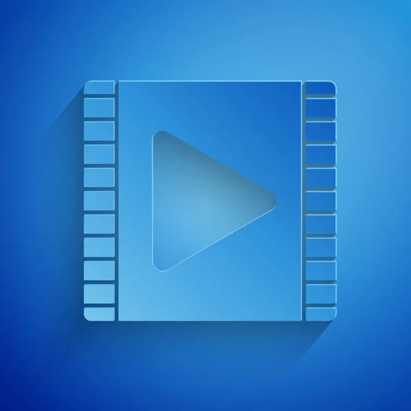 Corte de papel Reproducir icono de vídeo aislado sobre fondo azul. Película de tira con señal de juego. Estilo de arte de papel. Ilustración vectorial — Vector de stock