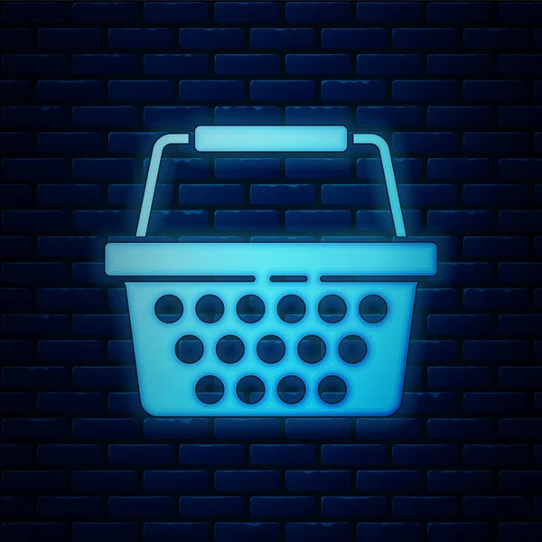 Gloeiende neon Shopping basket icoon geïsoleerd op bakstenen muur achtergrond. Online kopen concept. Bezorging bord. Winkelwagensymbool. Vector Illustratie — Stockvector