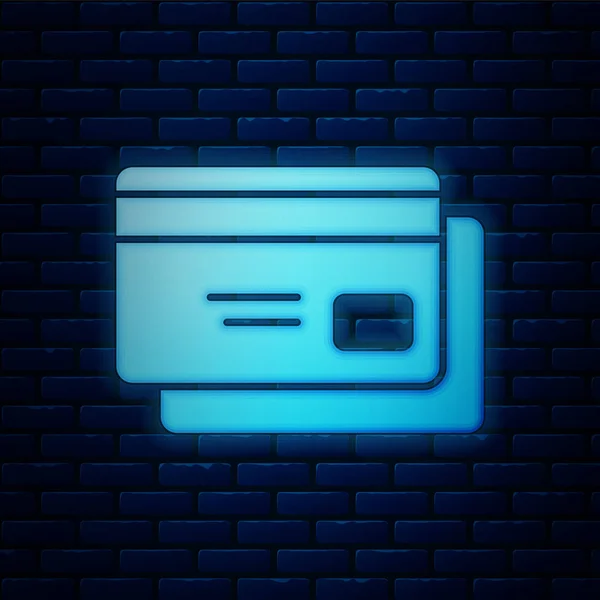 Neon incandescente icona della carta di credito isolato su sfondo muro di mattoni. Pagamento online. Ritiro contanti. Operazioni finanziarie. Segno della spesa. Illustrazione vettoriale — Vettoriale Stock
