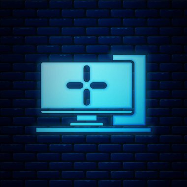 Parlayan neon bilgisayar monitörü simgesi tuğla duvar arka planında izole edildi. Bilgisayar bileşeni işareti. Vektör İllüstrasyonu